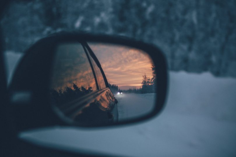 selective focus photography of wing mirror