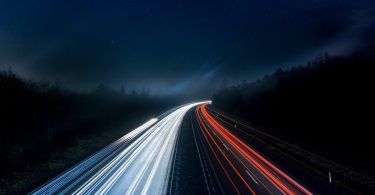 light trails on highway at night
