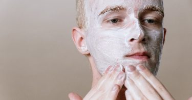 man with white powder on face