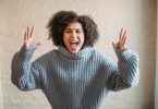 angry black woman screaming in room