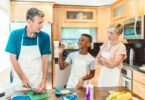 Happy family preparing food in the kitchen