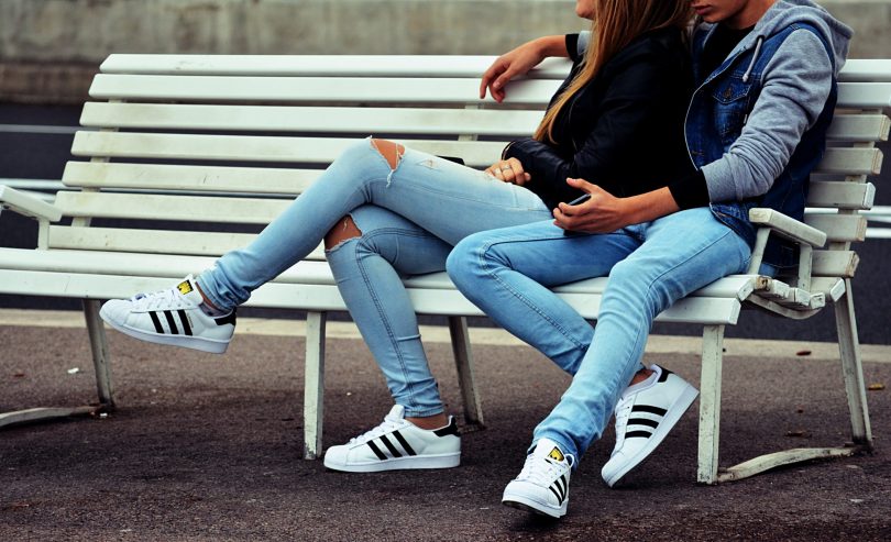 Couple sitting on bench