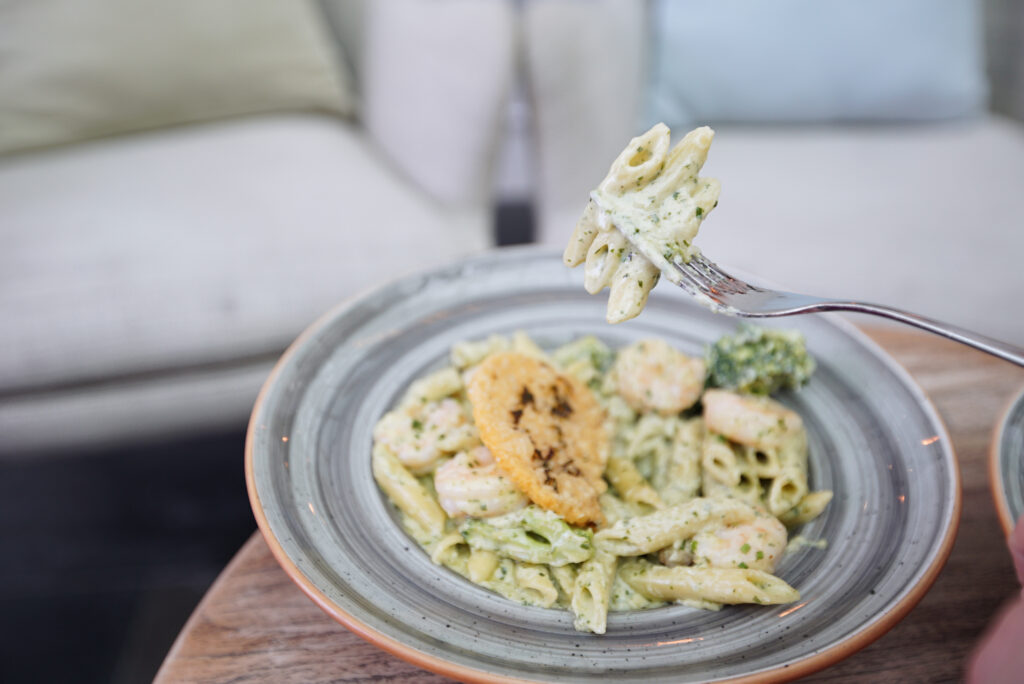 Creamy pasta on round plate