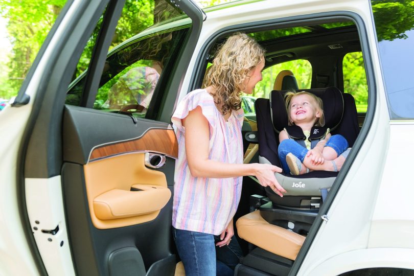 Joie spin safe with baby and mom